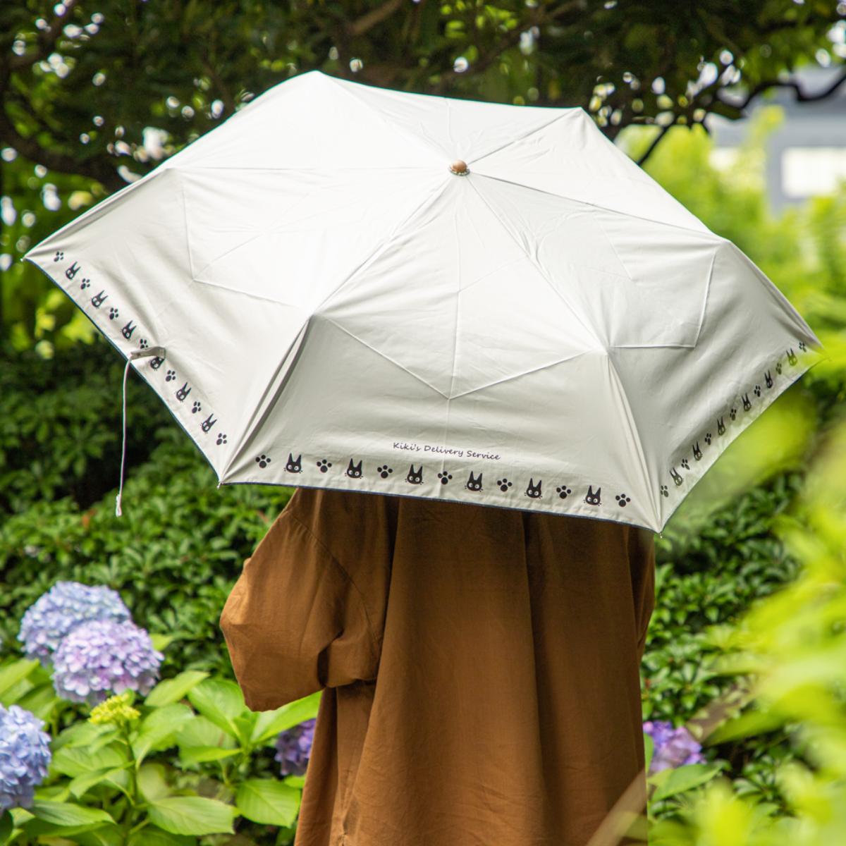 魔女の宅急便 晴雨兼用 折りたたみ傘 ジジと足跡 ホワイト | どんぐり